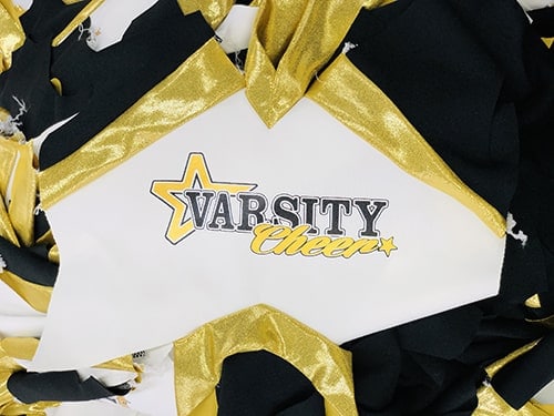 - Producing cheerleading uniforms for customers in the USA