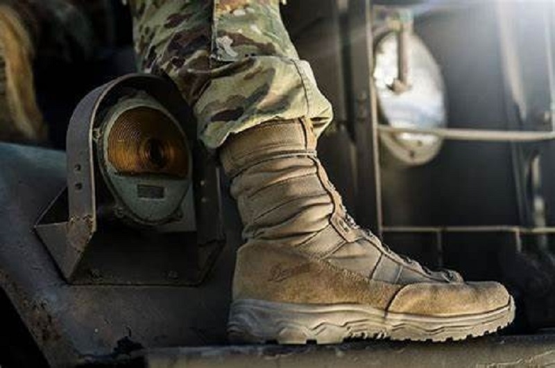Design shoes for a military uniform.