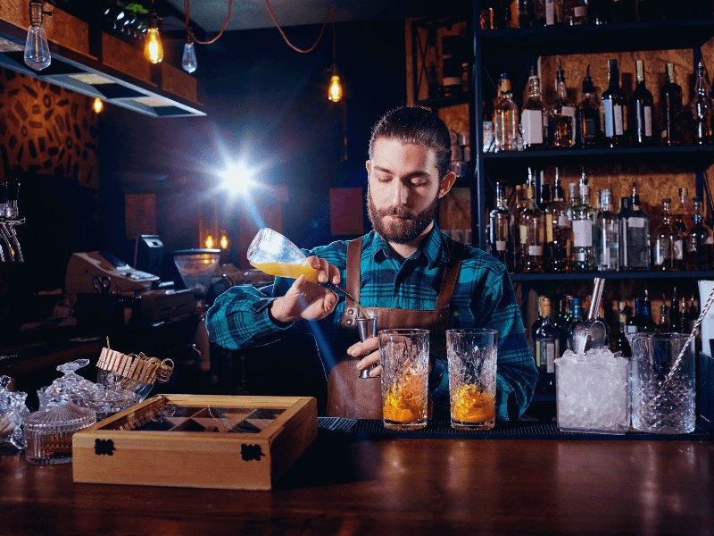 The bartender's attire ought to be practical and useful.